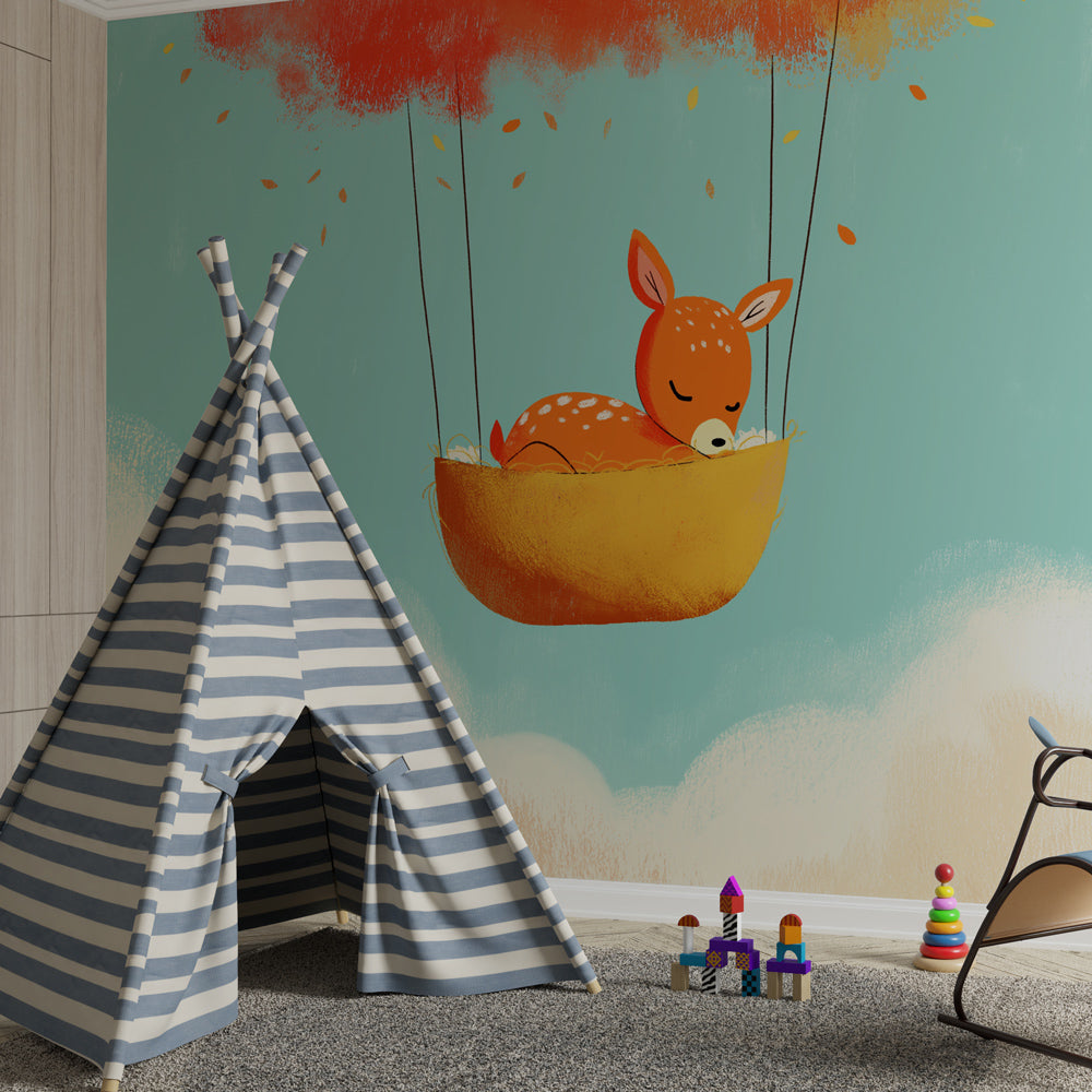 Sleeping fawn cloud wallpaper creating calming nursery atmosphere with natural wood crib