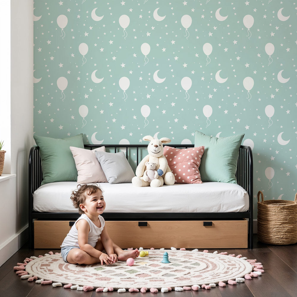 White balloon and star mural wallpaper in mint green nursery room by Kids-Mundo