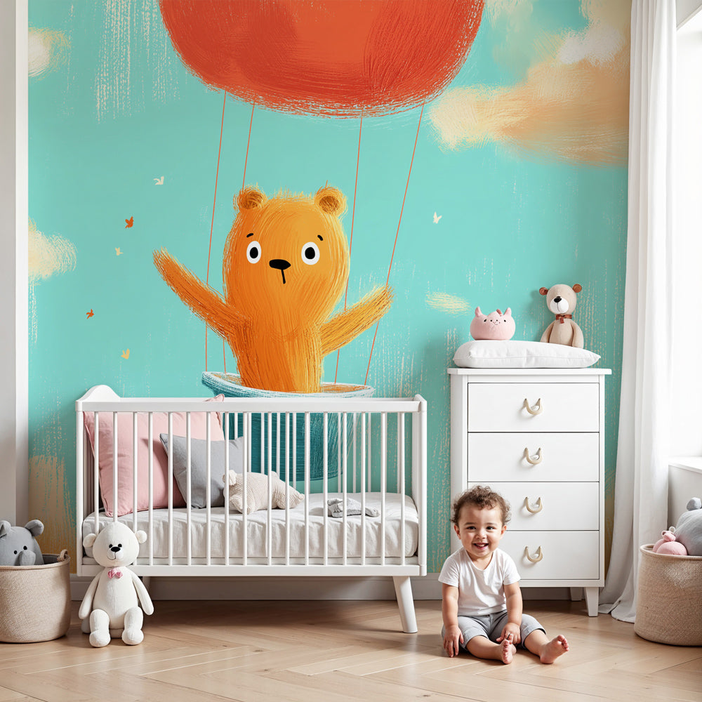 Bear hot air balloon mural wallpaper in modern baby nursery with soft blue tones by Kids-Mundo