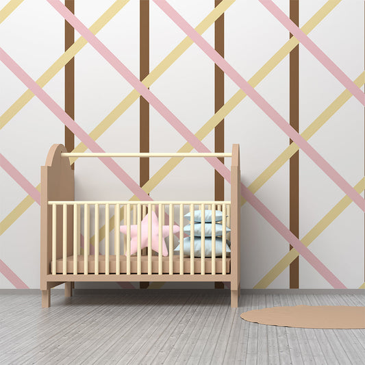 Kids-Mundo pink and cream diamond trellis wall mural behind a bed in a kids bedroom.