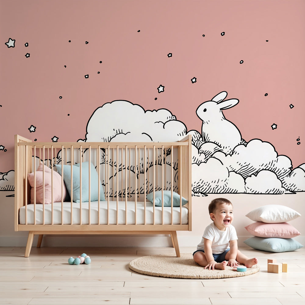 Bunny cloud mural wallpaper creating dreamy pink nursery atmosphere by Kids-Mundo