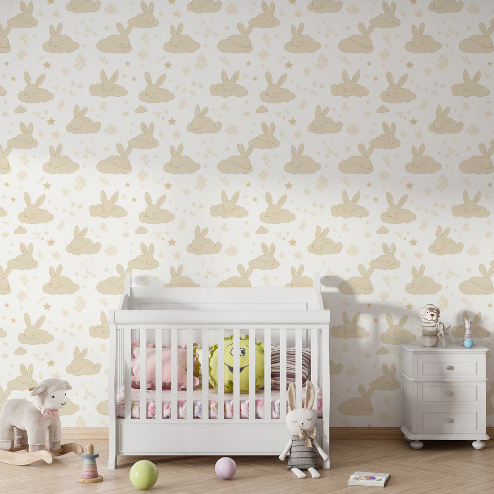 Dreamy rabbit wallpaper in neutral children's bedroom with soft cloud motifs and stars