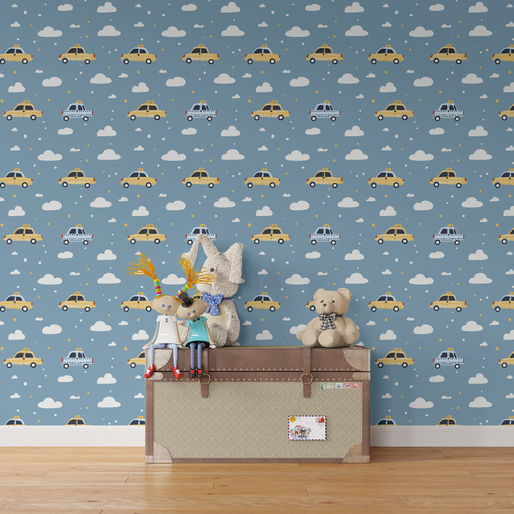 Cars wallpaper creating playful atmosphere in children's bedroom with blue sky and vehicle motifs