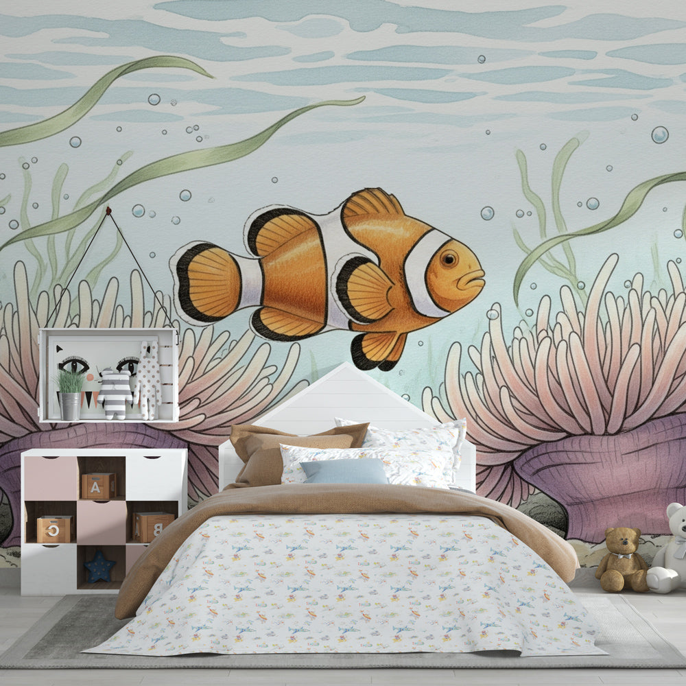 Colorful clownfish mural wallpaper creating underwater theme in children's bedroom