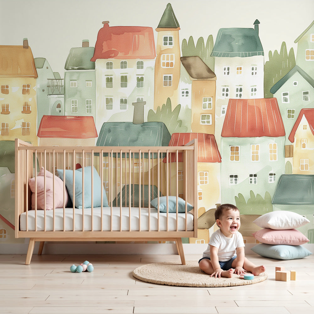 Watercolor houses mural wallpaper creating charming village scene in modern kids nursery by Kids-Mundo