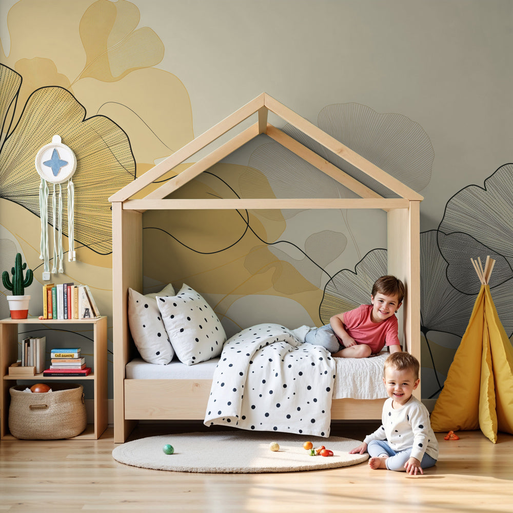 Delicate leaves mural wallpaper in soft yellow creating serene nursery atmosphere by Kids-Mundo