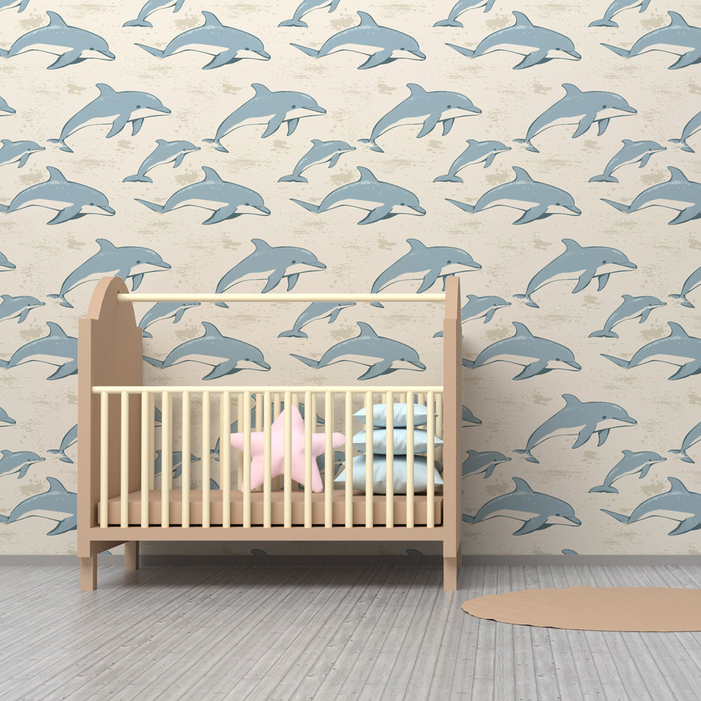 Ocean themed dolphin wallpaper transforming children's playroom into underwater paradise
