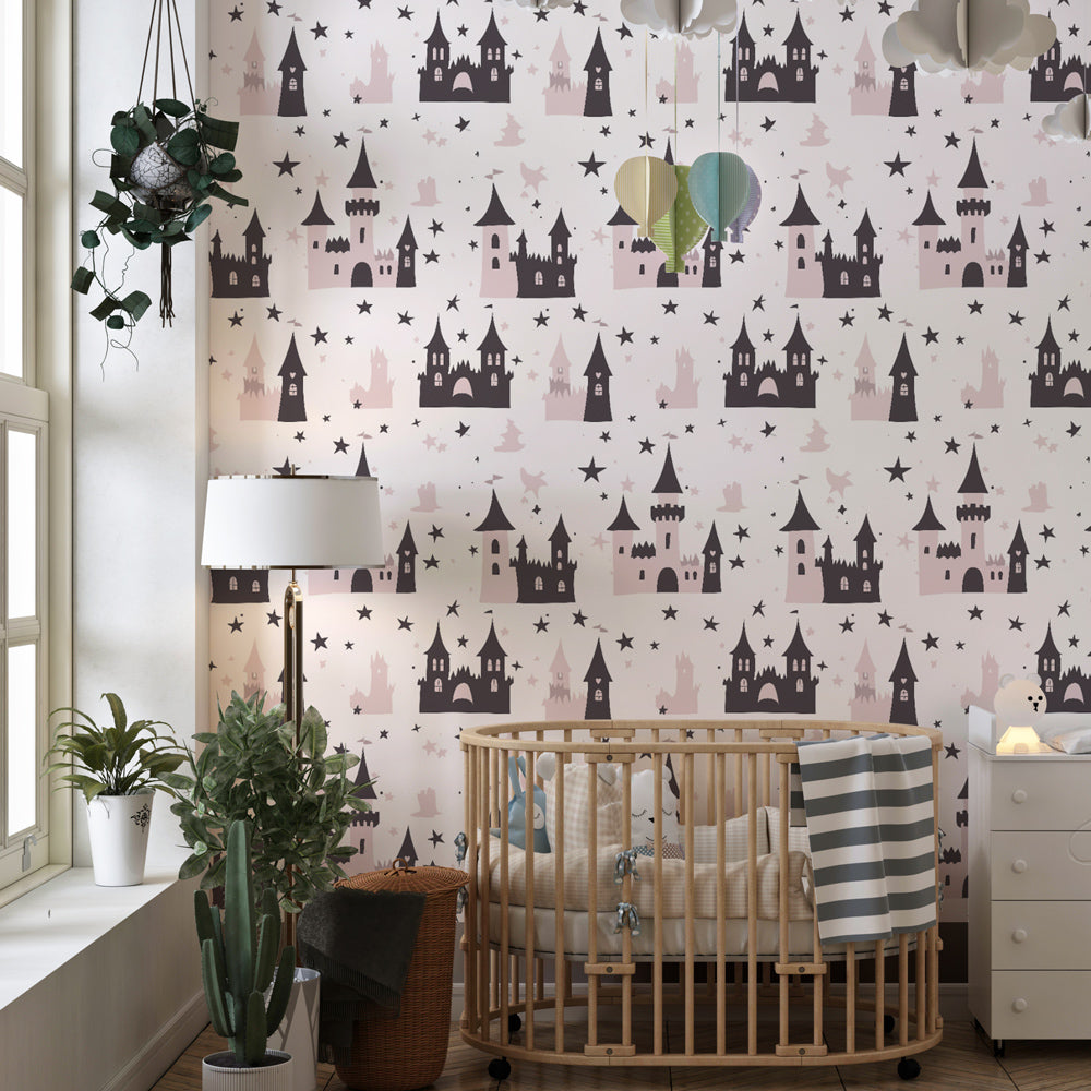 Magical castle wallpaper creating enchanting nursery atmosphere with soft pink and black design