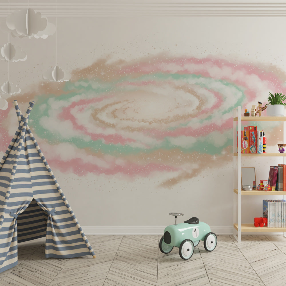 Galaxy space wallpaper creating dreamy kids bedroom decor with soft pink and green tones