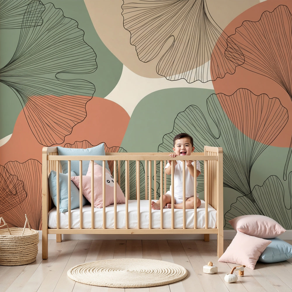 Ginkgo leaves mural wallpaper creating modern botanical nursery decor with natural wood furniture by Kids-Mundo