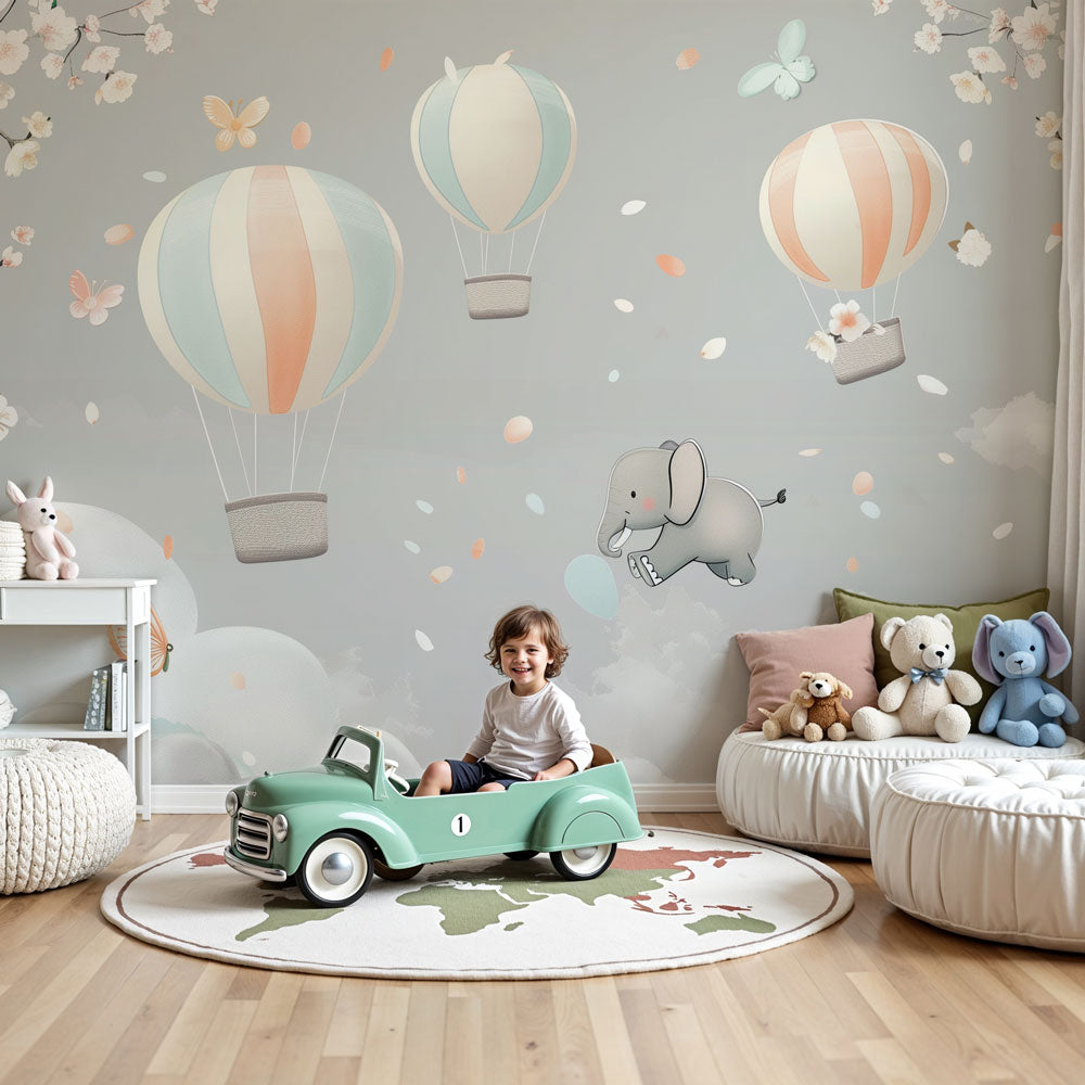 Hot air balloon mural wallpaper with dreamy elephant in modern nursery room by Kids-Mundo