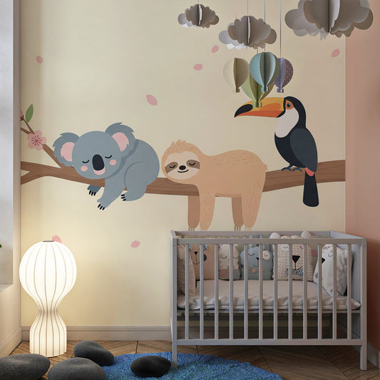 Kids-Mundo koala and sloth blossom wall mural bringing gentle warmth to a baby's bedroom.