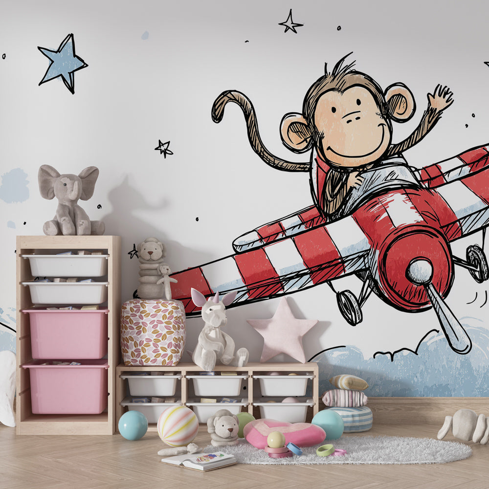 Sky adventure wallpaper featuring monkey in airplane creating magical kids bedroom decor