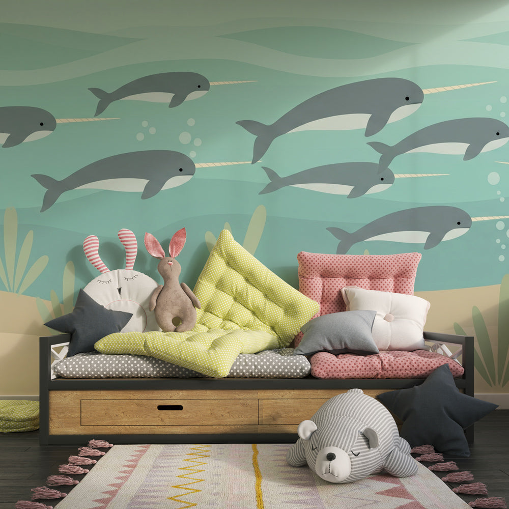 Underwater narwhal wallpaper transforming toddler bedroom into magical marine sanctuary