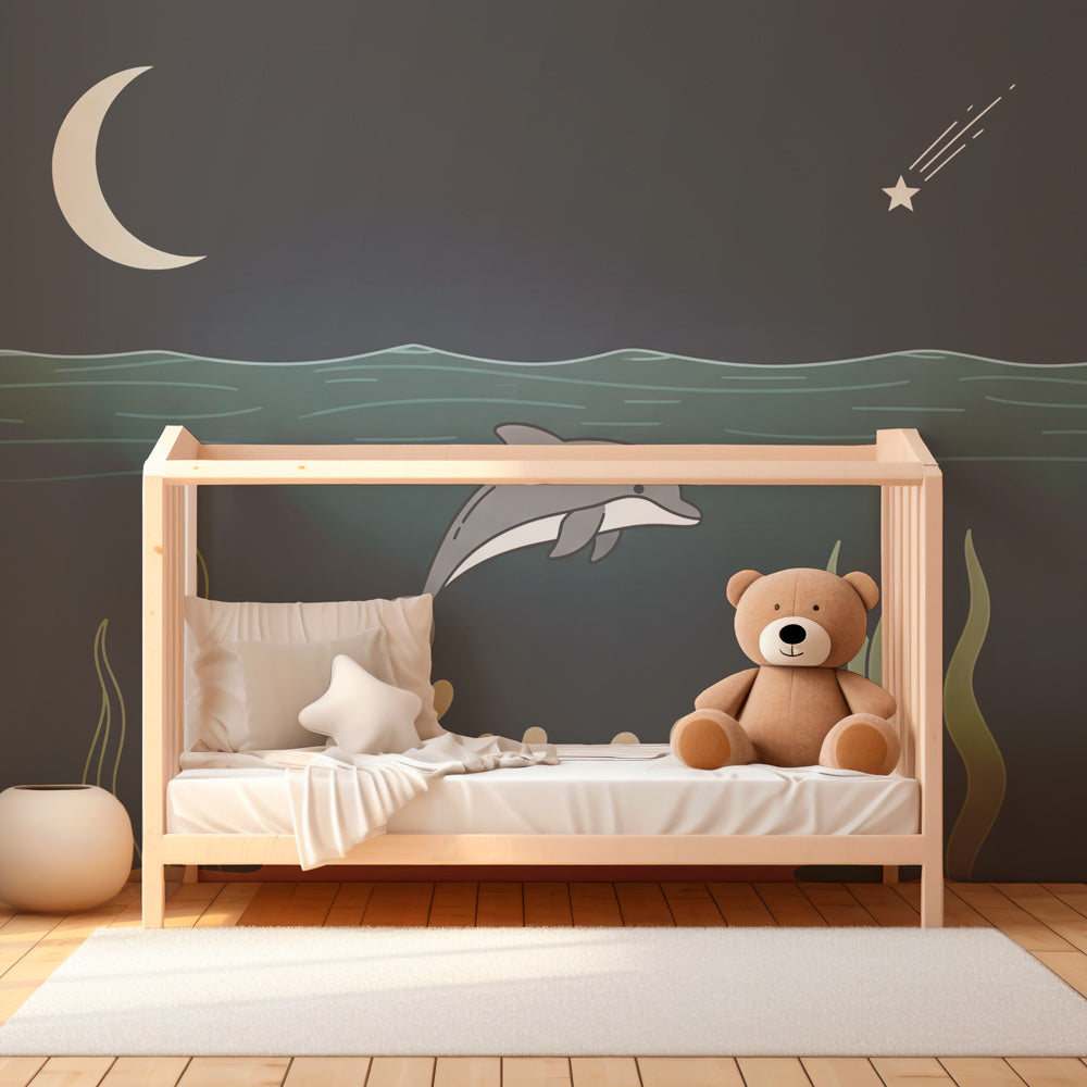 Marine themed wallpaper with dolphin and stars creating serene kids bedroom atmosphere