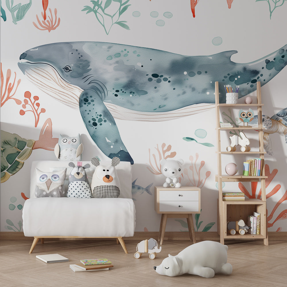 Watercolor sea life mural wallpaper with whales and turtles in modern kids bedroom
