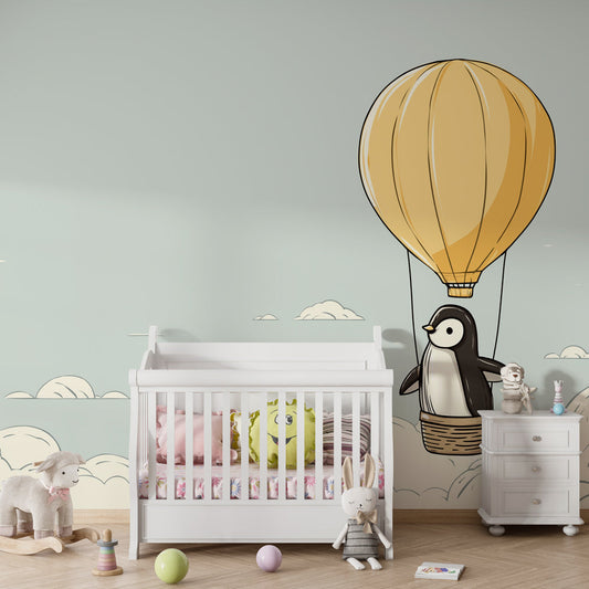 Kids-Mundo penguin balloon wall mural covering a kids bedroom feature wall with fluffy clouds