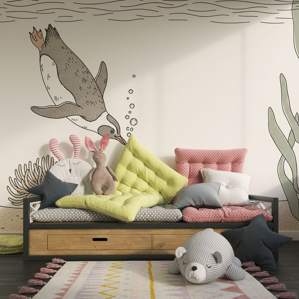 Ocean adventure wallpaper featuring diving penguin in children's bedroom decor
