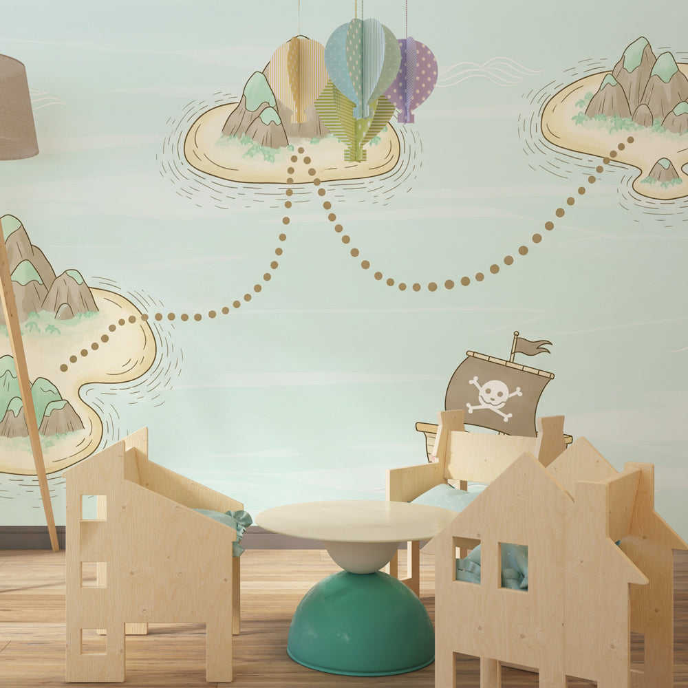 Adventure themed nursery featuring pirate ship treasure map wallpaper with golden trails by Kids-Mundo
