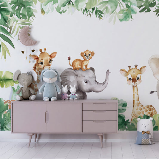 Kids-Mundo safari wall mural of giraffes and elephants behind a bed in a cheerful kids' bedroom.