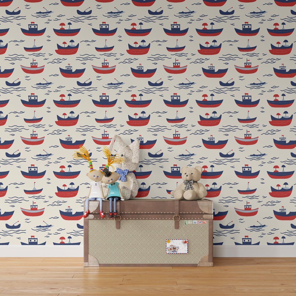 Maritime sailboat wallpaper creating adventurous kids bedroom with red and blue boats