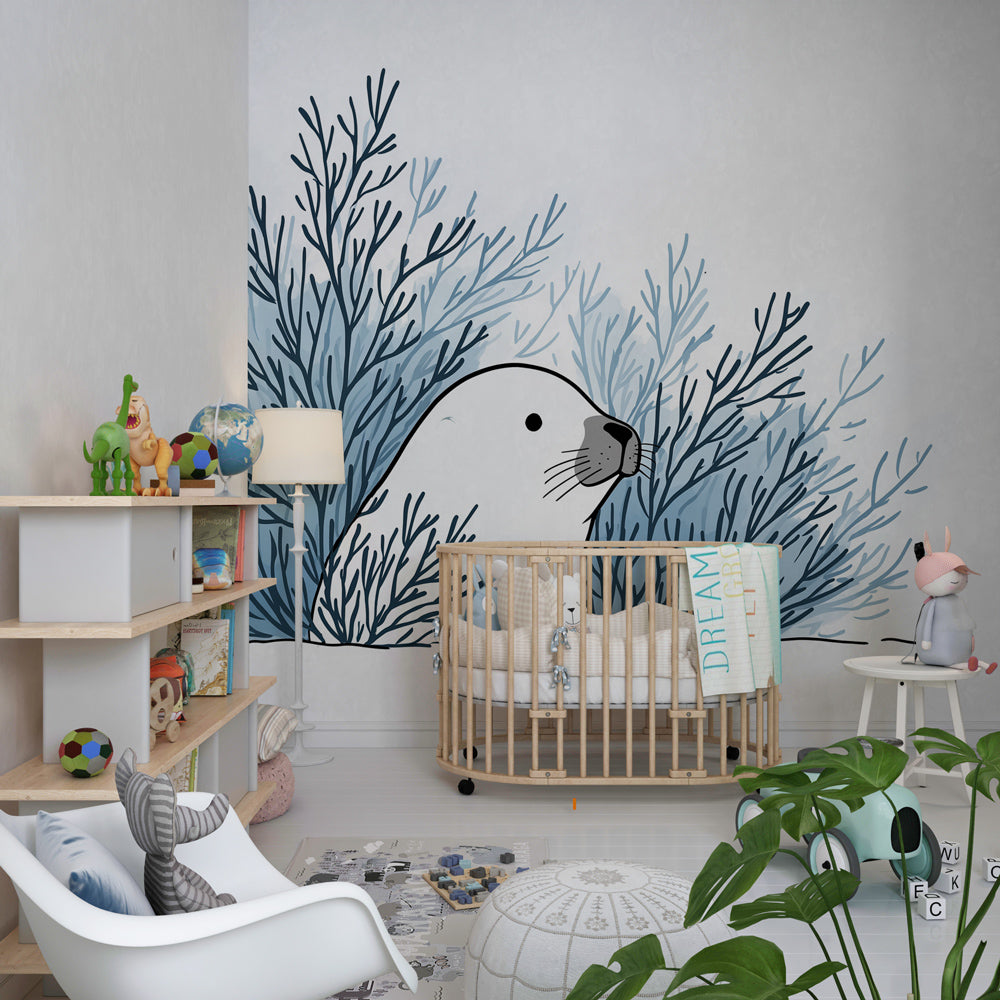 Ocean-themed children's bedroom with sea otter and seaweed mural wallpaper