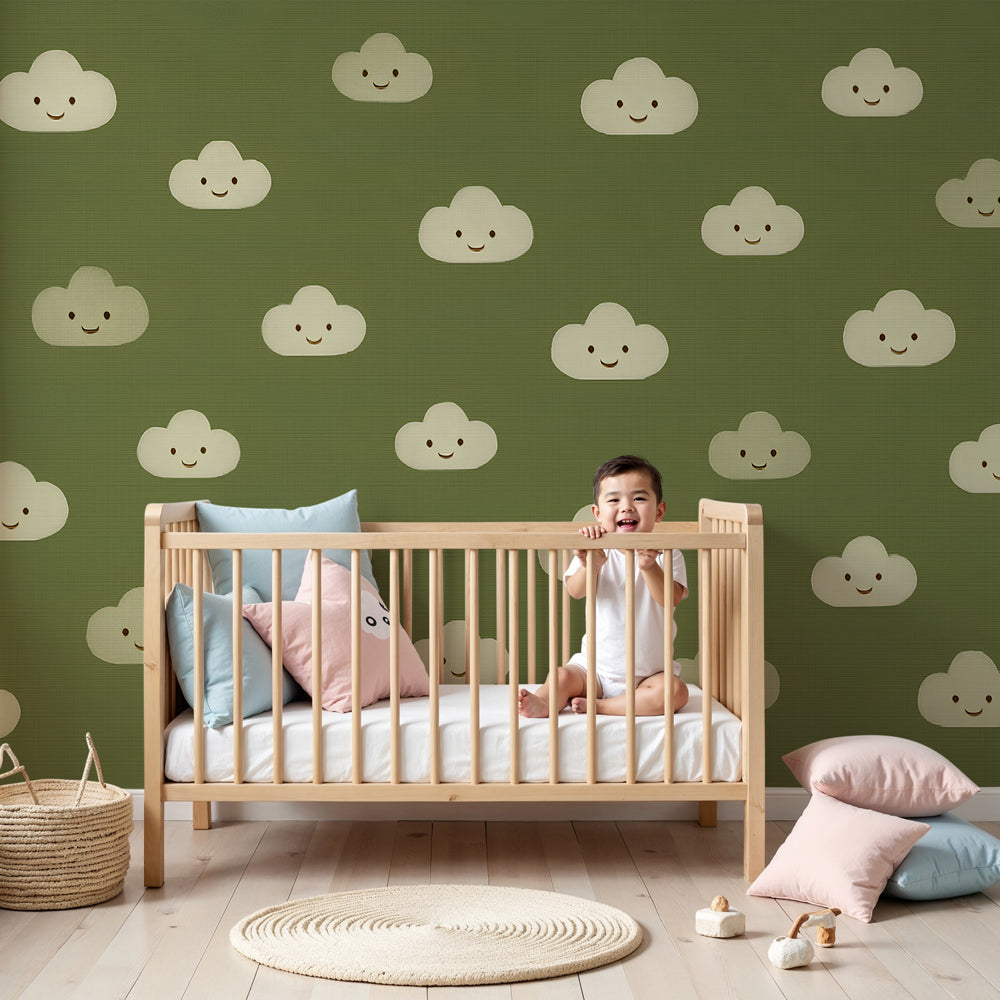 Smiling clouds mural wallpaper in modern baby nursery with green background by Kids-Mundo