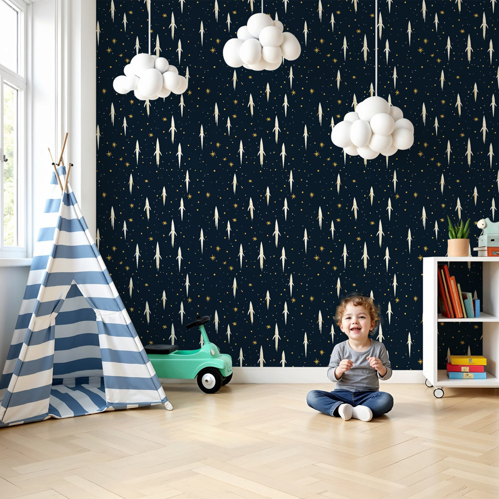 Space rocket mural wallpaper with white rockets on starry blue background in modern nursery by Kids-Mundo