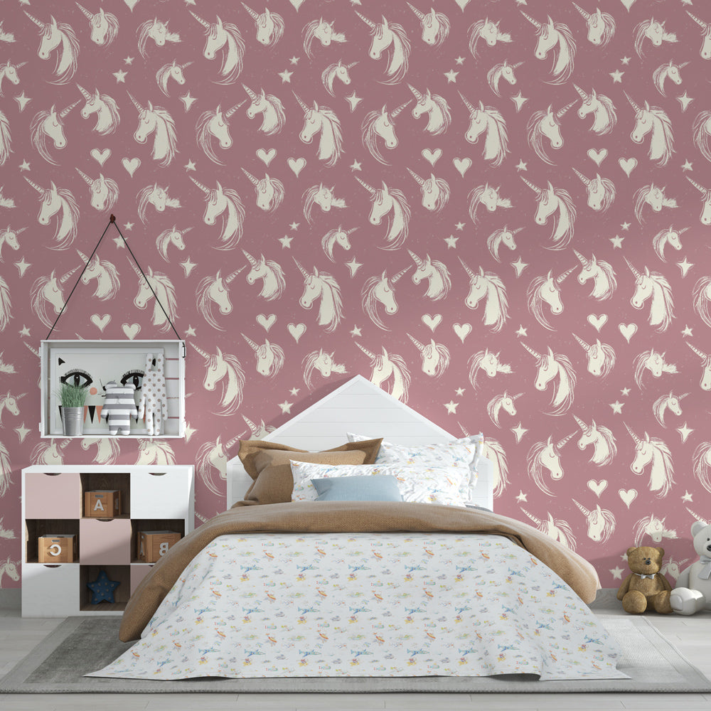 Pink unicorn wallpaper creating magical atmosphere in children's bedroom with hearts and stars