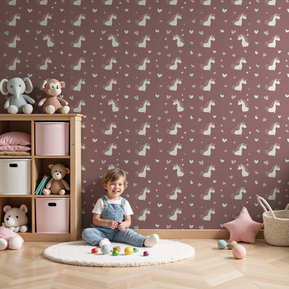 Pink unicorn mural wallpaper with hearts decorating a charming girls bedroom by Kids-Mundo