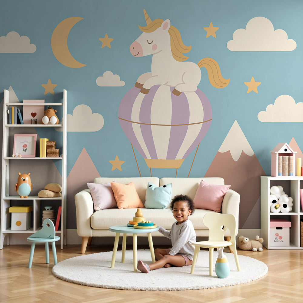 Unicorn hot air balloon mural wallpaper in modern nursery with pastel blue sky by Kids-Mundo