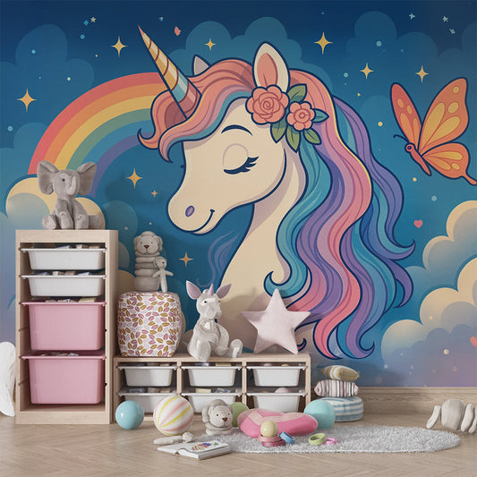 Kids-Mundo unicorn wall mural with rainbow and clouds behind a bed in a cosy kids bedroom