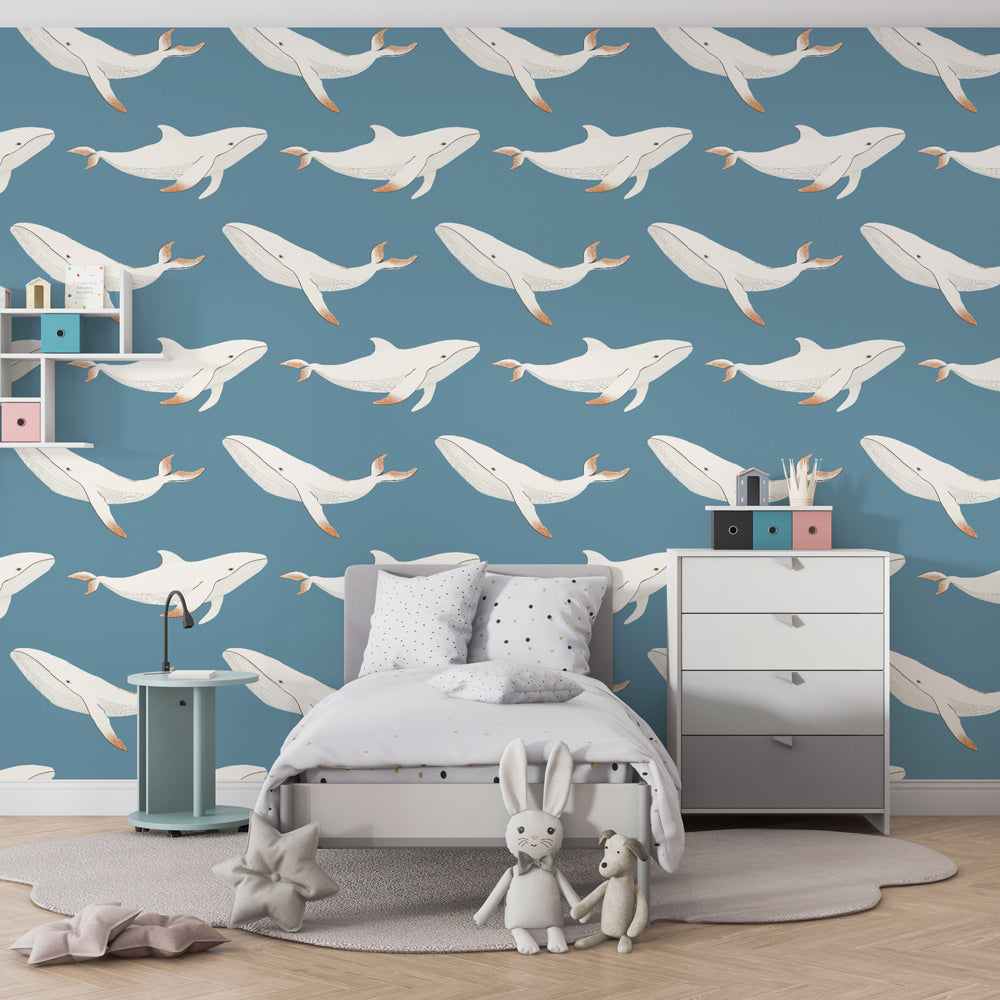Graceful whale wallpaper transforming children's bedroom into underwater adventure space