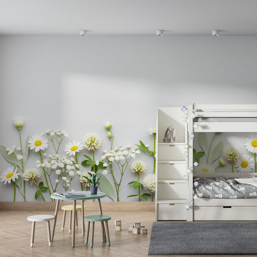 Soft white flower wallpaper with green foliage in cozy children's bedroom setting