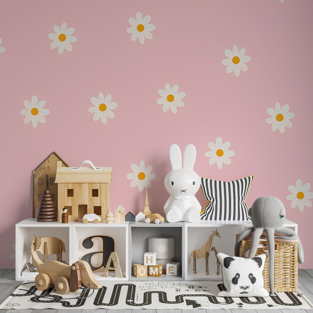Floral mural wallpaper creating peaceful children's bedroom with pink daisy pattern