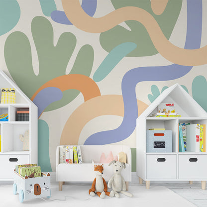 Kids-Mundo abstract organic shapes mural brightening a fun playroom wall with orange and sage tones.