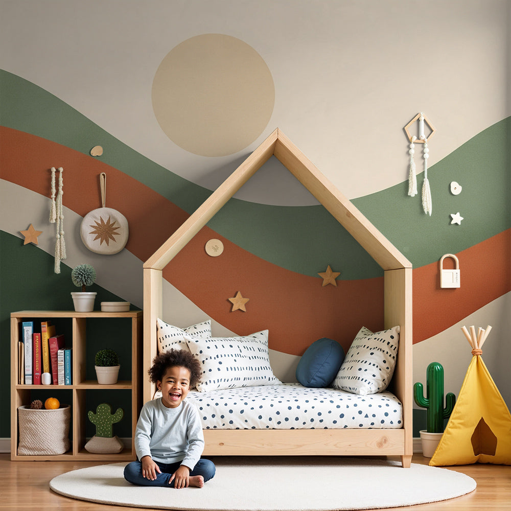 Kids-Mundo abstract wavy hills wall mural in warm sage and terracotta tones behind a nursery cot