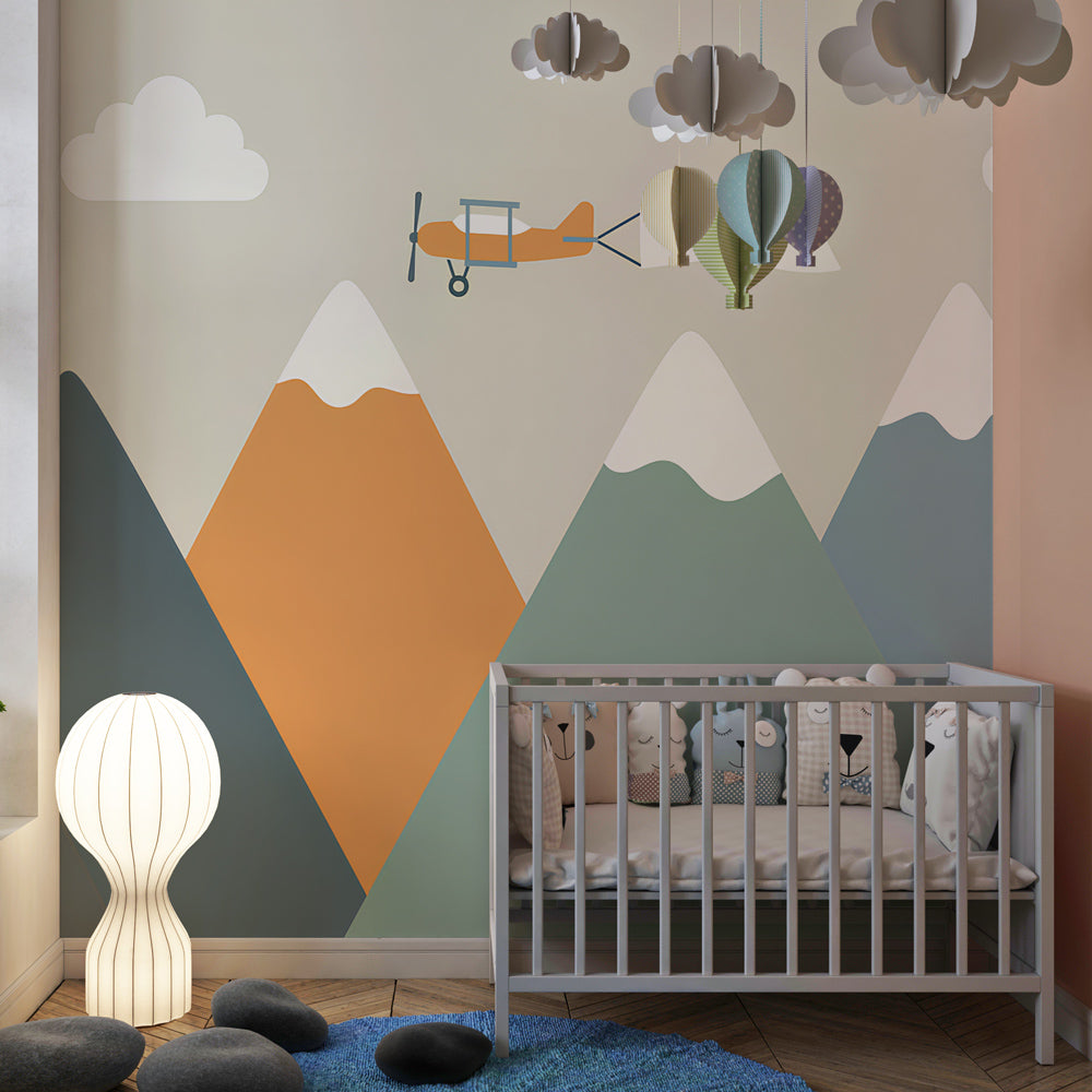 Colorful mountain airplane wallpaper creating adventure-themed kids bedroom decor