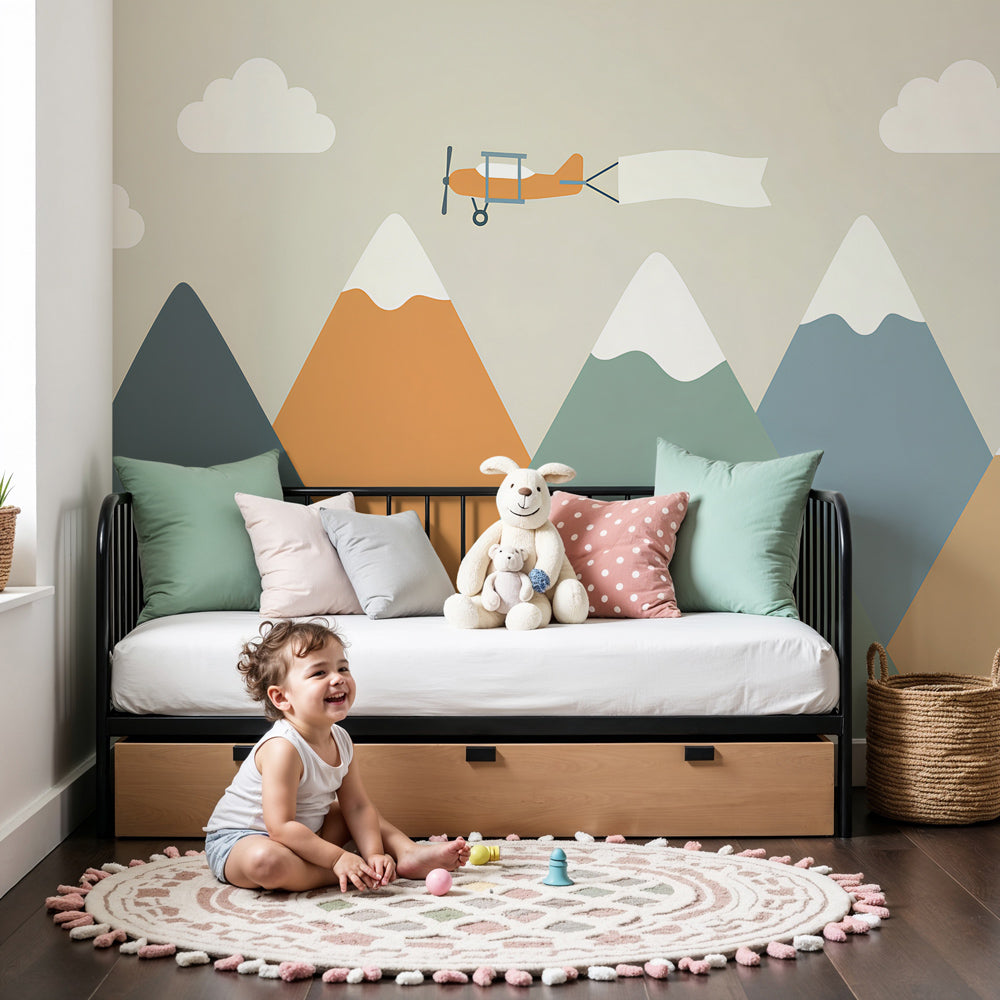 Airplane mountains mural wallpaper in modern nursery with natural wood furniture by Kids-Mundo