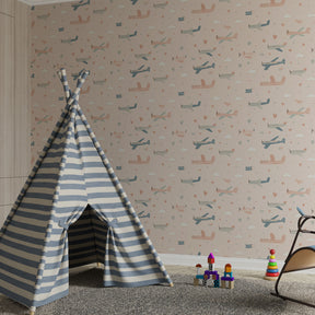 Airplane wallpaper with pastel background transforming children's bedroom into aviation wonderland
