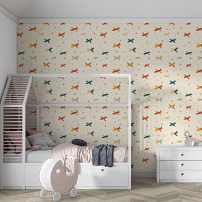 Multicolored planes wallpaper transforming playroom into adventure zone for kids