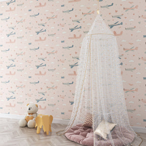 Whimsical airplane mural wallpaper creating imaginative playroom atmosphere by Kids-Mundo