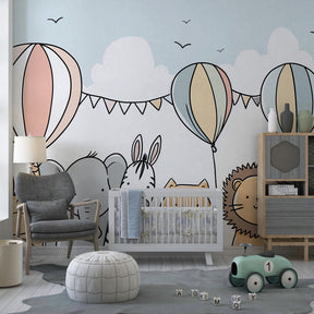 Colorful animal parade mural wallpaper transforming toddler playroom into celebration space