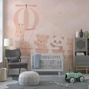 Children's room featuring animal friends hot air balloon mural wallpaper with cloud pattern