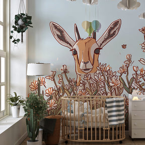 Children's bedroom featuring antelope meadow mural wallpaper with natural wood furniture