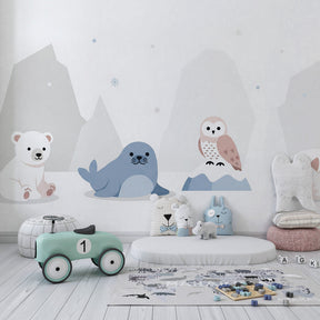 Winter animals wallpaper with seal and owl creating cozy kids bedroom decor