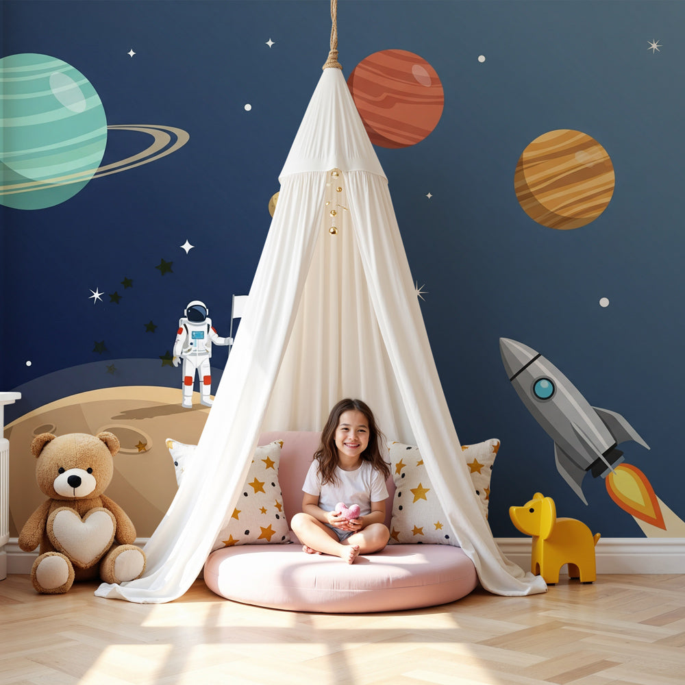 Kids-Mundo astronaut space wall mural styled above a cot, with planets and a rocket launch in a nursery