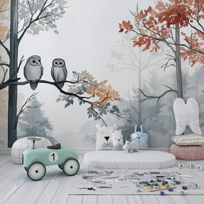 Forest owls mural wallpaper creating magical woodland atmosphere in kids bedroom