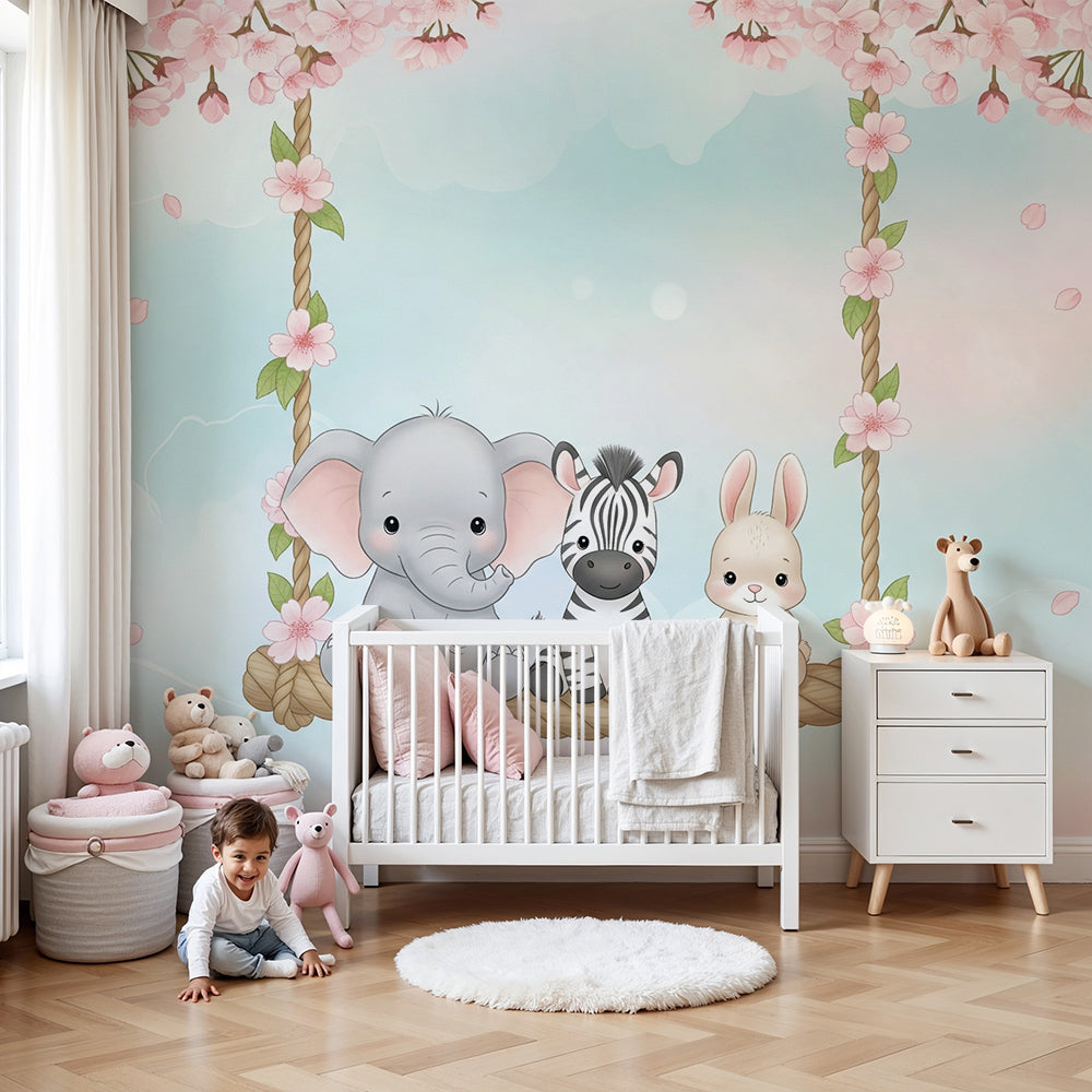 Baby animals blossom swing wall mural by Kids-Mundo behind a cot in a pastel nursery