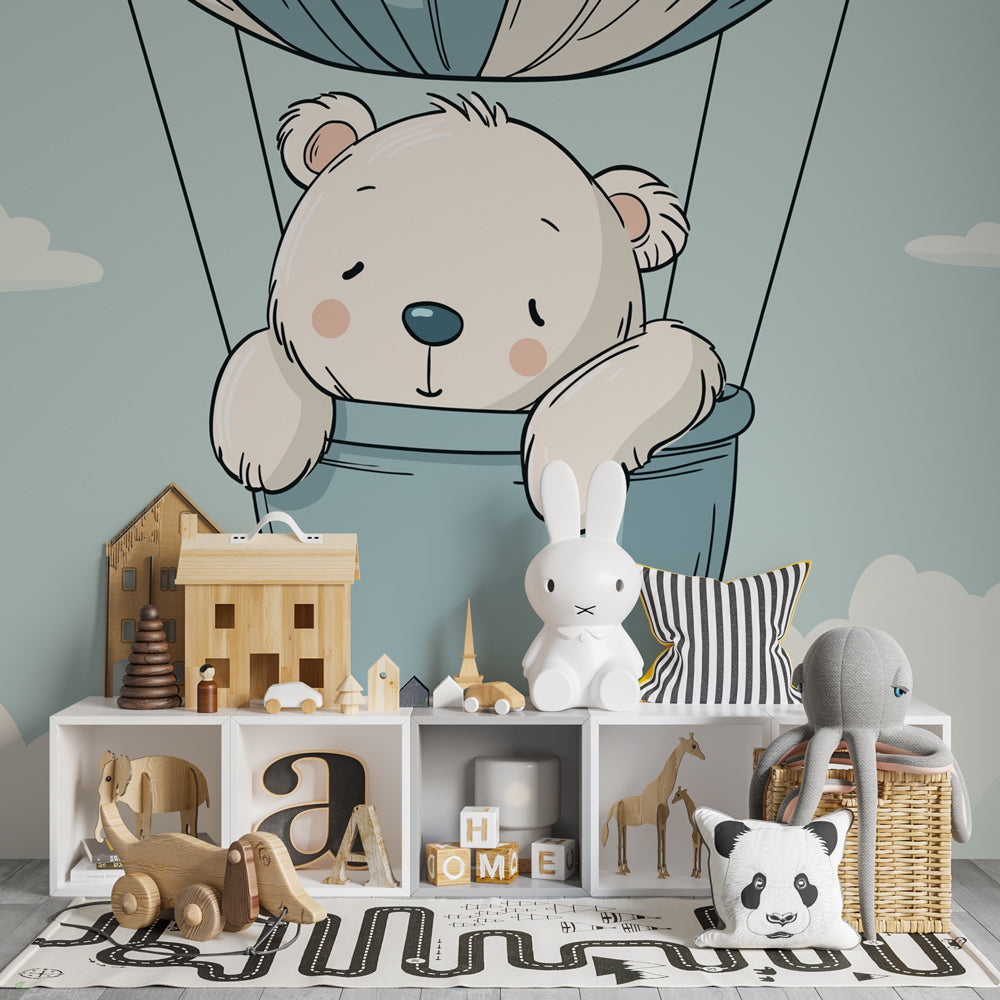 Dreamy bear balloon wallpaper creating peaceful nursery decor with pastel blue clouds